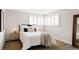 Bright bedroom featuring modern interior design elements and ample natural light at 3540 Everett St, Wheat Ridge, CO 80033