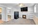 View of the fireplace with built in bookshelves from the bedroom doorway at 11278 W 103Rd Dr, Broomfield, CO 80021