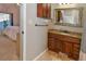 Bathroom view with granite vanity top and view into the bedroom at 1322 Kalamath St, Denver, CO 80204