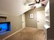 Bedroom featuring neutral colored walls and carpet with a white bookcase and a window at 1322 N Kalamath St, Denver, CO 80204