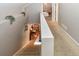 Second floor hallway overlooking piano and bedroom at 1322 Kalamath St, Denver, CO 80204