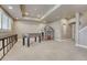 Finished basement area with recreation games, a toy house, and storage for a flexible living space at 5010 Persimmon Ln, Castle Rock, CO 80109