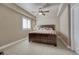Cozy bedroom with a ceiling fan, carpeted floor, and a comfortable bed and bedding at 5010 Persimmon Ln, Castle Rock, CO 80109