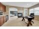 View from office into main bedroom with fireplace and seating area at 5010 Persimmon Ln, Castle Rock, CO 80109