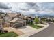 Charming two-story home with a three-car garage, landscaped yard and lovely curb appeal at 5010 Persimmon Ln, Castle Rock, CO 80109