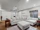 Cozy finished basement boasts recessed lighting, large sectional, and neutral paint at 11945 S Saunter Ln, Parker, CO 80138