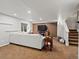 Finished basement features neutral paint, recessed lighting and carpeted stairs at 11945 S Saunter Ln, Parker, CO 80138