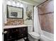 Inviting full bathroom with updated vanity, mirror and shower at 11945 S Saunter Ln, Parker, CO 80138