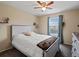 Cozy bedroom with bright window and updated decor at 11945 S Saunter Ln, Parker, CO 80138