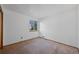 This room is carpeted, has white walls, and a small window at 8441 Urban Ct, Arvada, CO 80005