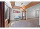 Bright dining room featuring a decorative light fixture and china cabinet at 8441 Urban Ct, Arvada, CO 80005