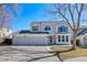 Charming two-story home with a three-car garage and well-maintained landscaping at 8441 Urban Ct, Arvada, CO 80005