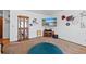 Bright living room with a display cabinet and a flat screen TV at 8441 Urban Ct, Arvada, CO 80005