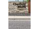 Chatfield Bluffs community sign constructed of stone at 8769 S Dudley St, Littleton, CO 80128