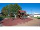 playground with swings and play structure at 10150 E Virginia Ave # 19-303, Denver, CO 80247