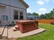 Backyard featuring a hot tub, offering relaxation and privacy in a well-maintained outdoor space at 3043 W 109Th Pl, Westminster, CO 80031