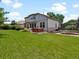 Expansive backyard featuring a hot tub, trampoline, and well-manicured lawn, perfect for Gathering fun at 3043 W 109Th Pl, Westminster, CO 80031