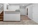 Finished basement bar with stairs, and access to bathroom and additional storage at 3043 W 109Th Pl, Westminster, CO 80031
