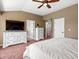 This primary bedroom showcases an ensuite bath and plush carpet at 3043 W 109Th Pl, Westminster, CO 80031