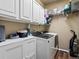 Finished basement laundry room with modern washer and dryer at 3043 W 109Th Pl, Westminster, CO 80031