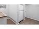 Finished basement storage area with neutral decor and vinyl flooring at 3043 W 109Th Pl, Westminster, CO 80031
