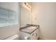 Comfortable bathroom features granite countertop and a large mirror at 4903 Basalt Ridge Cir, Castle Rock, CO 80108