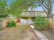 Cozy backyard featuring a covered patio and ample space, perfect for entertaining at 3304 W 3Rd Ave, Denver, CO 80219