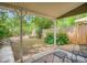Backyard featuring patio, grass, and plants at 3304 W 3Rd Ave, Denver, CO 80219