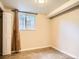 Bedroom with window and neutral walls at 3304 W 3Rd Ave, Denver, CO 80219