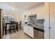 Kitchen with stainless steel appliances, granite countertops and breakfast nook at 5295 Perry St, Denver, CO 80212
