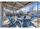Outdoor patio with seating and firepit, perfect for entertaining guests at 5295 Perry St, Denver, CO 80212