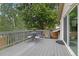 Outdoor deck with a table and four chairs at 12466 E Amherst Cir, Aurora, CO 80014