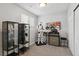 Interesting bonus room featuring carpeted floors, media center, a stormtrooper, and music memorabilia at 13040 W 63Rd Pl # A, Arvada, CO 80004
