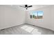 Bedroom with carpet floors, neutral walls, and a window at 2259 Kipling St, Lakewood, CO 80215