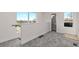 Cozy loft area featuring carpeted floors and plenty of natural light at 2259 Kipling St, Lakewood, CO 80215