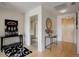Welcoming entryway with hardwood floors, stylish console table, and modern decor at 1438 Little Raven St # 306, Denver, CO 80202