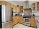 Updated kitchen featuring stainless steel appliances, and ample storage space at 1438 Little Raven St # 306, Denver, CO 80202
