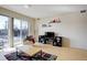 Cozy living room featuring hardwood floors, large windows, and a contemporary design at 1438 Little Raven St # 306, Denver, CO 80202