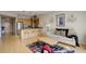 Open living space showcasing a modern kitchen flowing into a comfortable living area at 1438 Little Raven St # 306, Denver, CO 80202