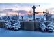 Scenic winter scene showcasing snow-covered trees and structures against a colorful sky at 1438 Little Raven St # 306, Denver, CO 80202