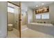 Bathroom features a toilet, shower, and soaking tub at 5401 Antler Run, Littleton, CO 80125