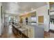 Sleek kitchen with light wood cabinetry and expansive windows at 5401 Antler Run, Littleton, CO 80125