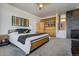 Main bedroom with built-in shelving and fireplace at 5401 Antler Run, Littleton, CO 80125