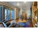 Relaxing sitting area with hardwood floors and natural light at 5401 Antler Run, Littleton, CO 80125