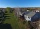 Backyard aerial view showcasing a deck and mature trees in a serene outdoor setting at 10987 Cannonade Dr, Parker, CO 80138