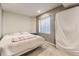 Bedroom with a bed, a window, and a full sized mattress, perfect for relaxation at 10987 Cannonade Dr, Parker, CO 80138