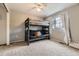 Bedroom featuring a bunk bed and carpeted floor with a view of the yard from the window at 10987 Cannonade Dr, Parker, CO 80138