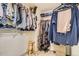 A fully organized walk-in closet with ample storage space for clothing and accessories at 10987 Cannonade Dr, Parker, CO 80138