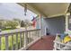 View from the cozy front porch with a bench and view of the neighborhood at 10987 Cannonade Dr, Parker, CO 80138