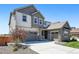 Well maintained 2-story home with a 3-car garage and manicured yard at 740 Meadowlark Dr, Erie, CO 80516
